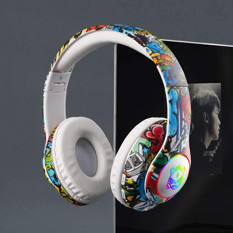 Bluetooth Glowing graffiti headphones, Luminous Design, Card Insertable- Supports memory card insertion, Multi-Compatibility, Long Battery Life 200mAh battery capacity, Lightweight 200g