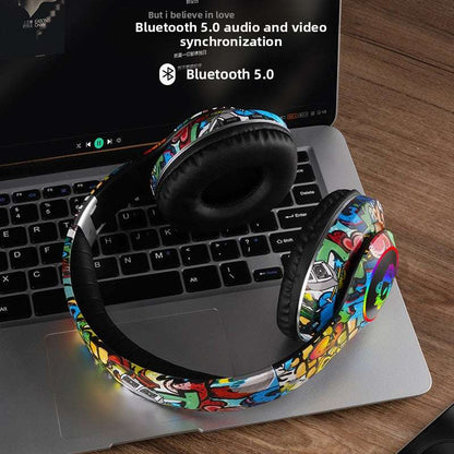 Bluetooth Glowing graffiti headphones, Luminous Design, Card Insertable- Supports memory card insertion, Multi-Compatibility, Long Battery Life 200mAh battery capacity, Lightweight 200g